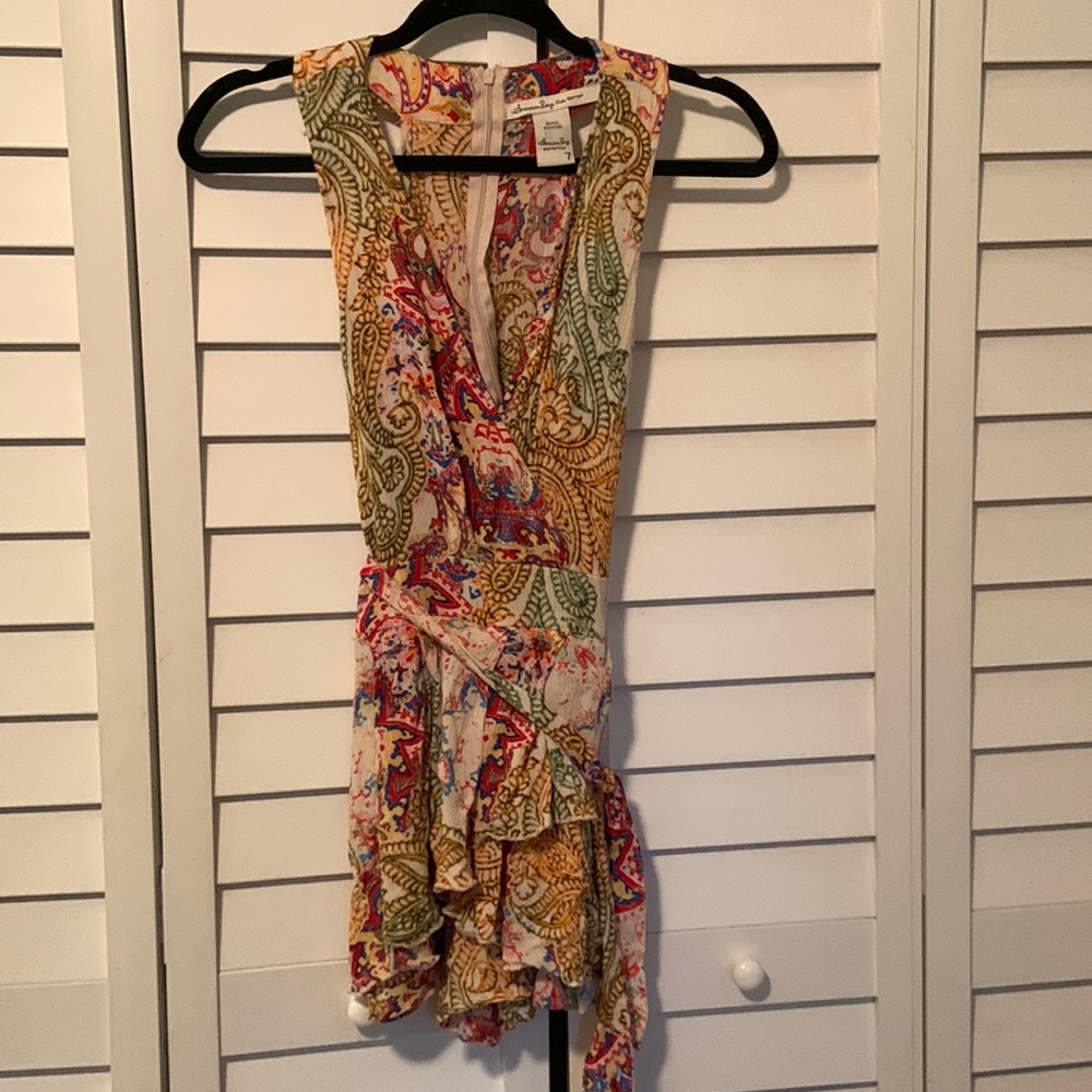 Multicolored zip back wrap tie ruffled shorts romper